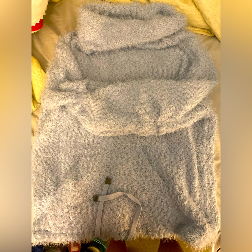 Fuzzy cowl neck sweater.